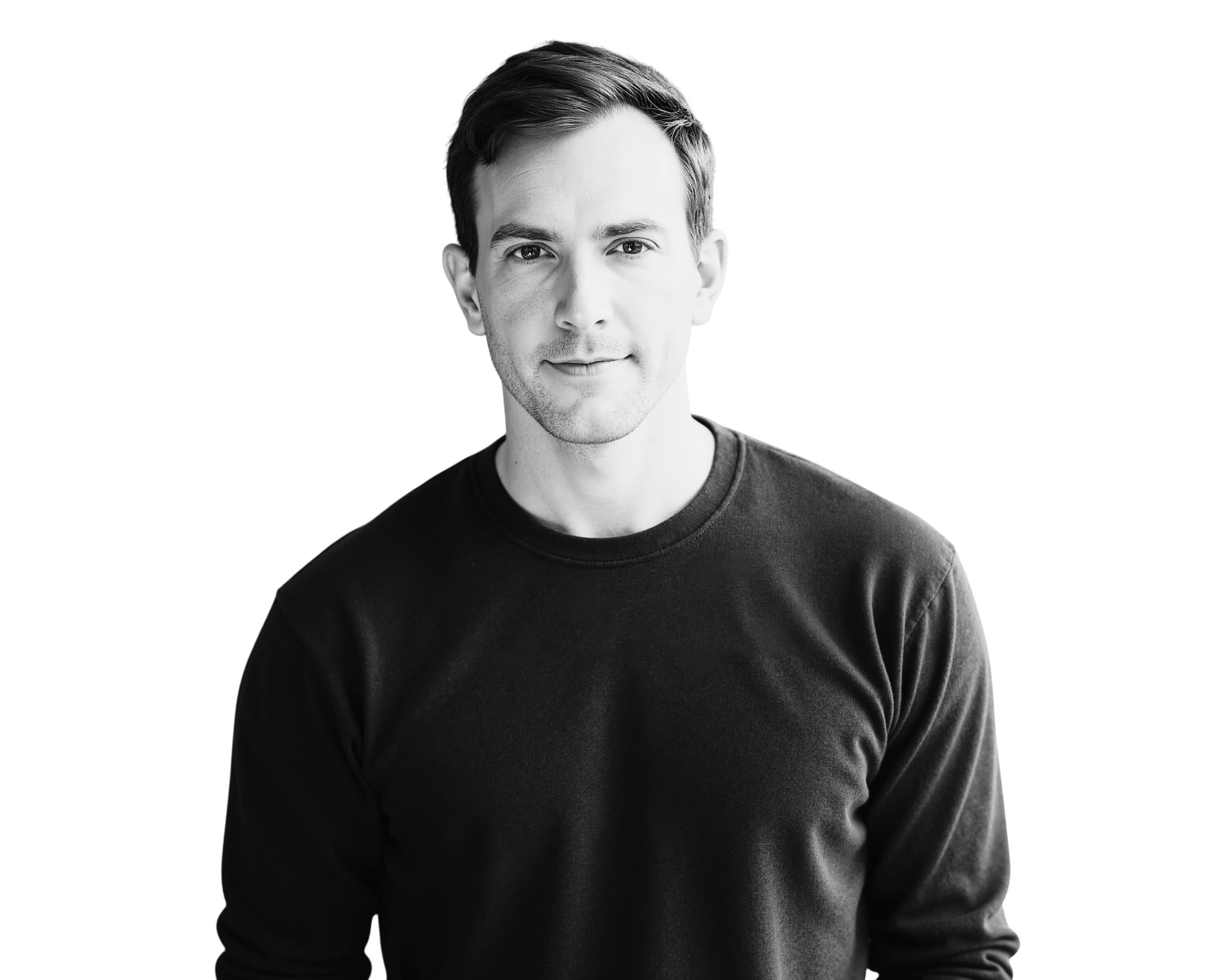 Black-and-white portrait of Matthew Oberly wearing a dark crewneck